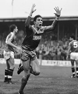 Images Dated 30th November 1986: Wimbledon footballer Vinnie Jones raises his arms as he celebrates scoring the game'