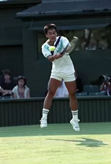Images Dated 22nd June 1988: Wimbledon Tennis. Henri Leconte v. Michael Chang. June 1988 88-3353-013