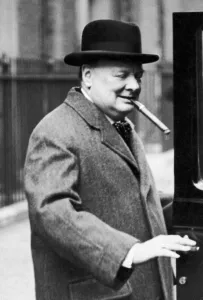 00363 Gallery: Winston Churchill pictured smoking a cigar, circa March 1938