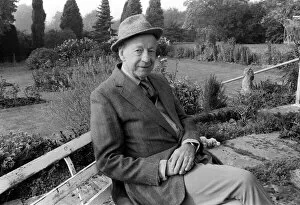 Cornwall and West Devon Mining Landscape Collection: Winston Graham author novelist and screen writer October 1985 seated on a bench in his