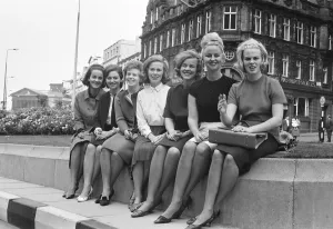 00244 Gallery: Wives of seven of the players from the Reykjavik football team of Iceland sitting on a