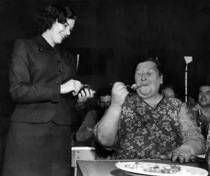 Woman eating dinner in the canteen at a labour factory. August 1952 P009089 Woman eating dinner in the canteen at a labour factory. August 1952 P009089