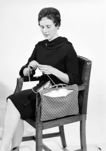 Woman knitting pose in the Daily Mirror studios Circa 1959 Woman knitting pose in the Daily Mirror studios Circa 1959