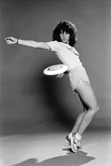 Images Dated 11th June 1980: A woman performing exercises with a frisbee. June 1980
