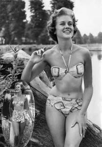 Woman wearing a bikni during a day out. July 1959 P018020 Woman wearing a bikni during a day out. July 1959 P018020