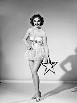 Woman wearing Christmas fairy fancy dress. 1959 Woman wearing Christmas fairy fancy dress. 1959