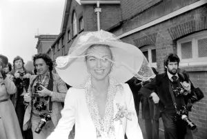 Woman wearing a large hatduring the second day of races at Ascot today Woman wearing a large hatduring the second day of races at Ascot today