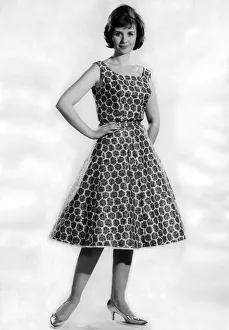 Woman wearing a patterned flared dress. May 1962 P011064 Woman wearing a patterned flared dress. May 1962 P011064