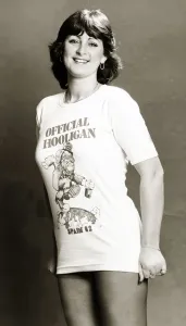 Woman wearing t-shirt reading Official Hooligan - Spain 1982 Woman wearing t-shirt reading Official Hooligan - Spain 1982