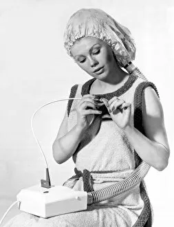 Images Dated 25th January 1972: Women - Beauty Culture The Vanity Hair Dryer - Model 8204 - A hair dryer with its