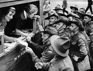00154 Gallery: Two women touring London in a mobile information van give directions to Australian