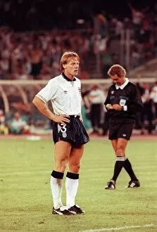 Images Dated 4th July 1990: World Cup 1990 Semi Final England 1 West Germany 1 Stuart Pearce stands with