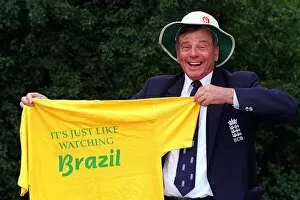 Images Dated 4th August 1997: World famous cricket umpire Harold Dickie Bird holding a T-Shirt that barnsley fanswear