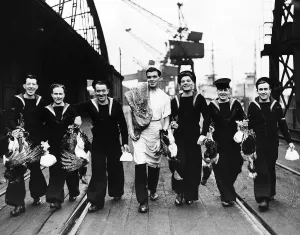 WW2 December 1943 Sailors from minesweepers taking aboard Xmas fare at an East WW2 December 1943 Sailors from minesweepers taking aboard Xmas fare at an East