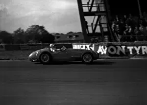 Motorsport Gallery: Y2K Stirling Moss 1954 winning Aintree Trophy Race Liverpool in a Masserati motor car