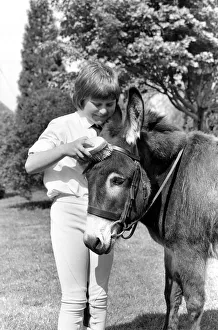 Nine year old girl with donkey at the Donkey racing championships May 1975 Nine year old girl with donkey at the Donkey racing championships May 1975