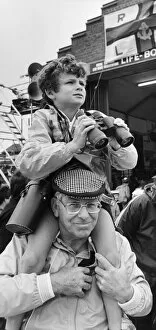 Images Dated 23rd August 1982: Eight year old Paul Adams on the shoulders of his uncle Reg Birtall at the Hoylake