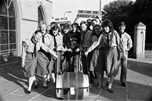 These young barrel boys and girls hope the money will come rolling in from a wacky These young barrel boys and girls hope the money will come rolling in from a wacky