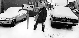 A young boy braves the snow on his paper round in the village of Pity Me in Durham A young boy braves the snow on his paper round in the village of Pity Me in Durham