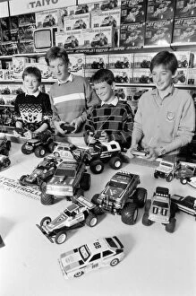 Images Dated 21st October 1986: Young boys playing with toy remote control cars in Hamley s, London