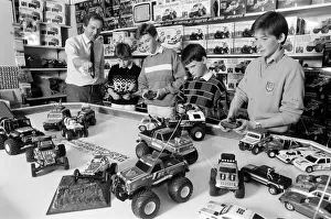 Images Dated 21st October 1986: Young boys playing with toy remote control cars in Hamley s, London