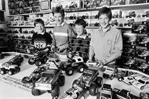 Images Dated 21st October 1986: Young boys playing with toy remote control cars in Hamley s, London