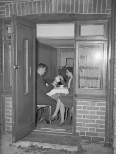 A young couple seen here taking afternoon tea . 30th October 1946 A young couple seen here taking afternoon tea . 30th October 1946