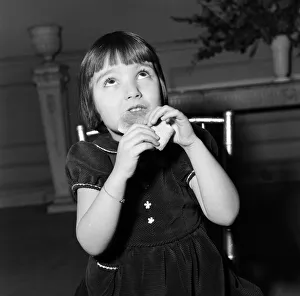A young girl, Candy Paterson, eating her crusts. 4th February 1954 A young girl, Candy Paterson, eating her crusts. 4th February 1954