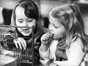 00055 Gallery: These young girls learn the art of calculating with the help of a abacus