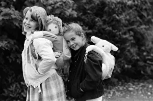 Images Dated 21st October 1986: Two young girls wearing soft toy rucksacks. 21st October 1986