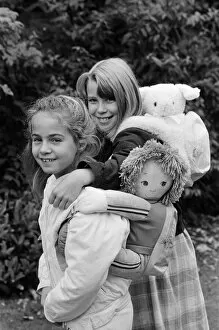 Images Dated 21st October 1986: Two young girls wearing soft toy rucksacks. 21st October 1986