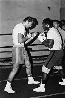 A young Joe Bugner going through his paces with World Heavyweight Champ Joe Frazier A young Joe Bugner going through his paces with World Heavyweight Champ Joe Frazier