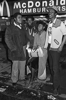 Images Dated 3rd April 1980: Young people standing outside McDonalds. 3rd April 1980