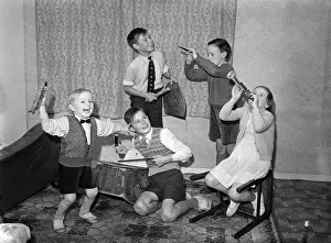 A young skiffle group playing their instruments. Left to right in front, Leslie Bennett A young skiffle group playing their instruments. Left to right in front, Leslie Bennett