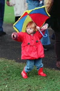 Youngsters dressed for the wet weather during the Great Toddle for Children in Need at Youngsters dressed for the wet weather during the Great Toddle for Children in Need at