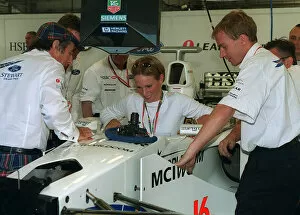 Images Dated 12th July 1999: Zara Phillips British Grand Prix Silverstone 1999 she squeezes into a Stewart Ford