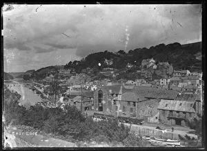 East Looe Quays with cargo trucks on railway track East Looe Quays with cargo trucks on railway track
