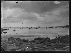 Looe Bay with variety of boats, from the beach Looe Bay with variety of boats, from the beach