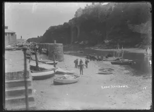 Looe Harbour Mouth with ferry boats being loaded Looe Harbour Mouth with ferry boats being loaded