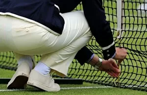 Umpire Checks Net