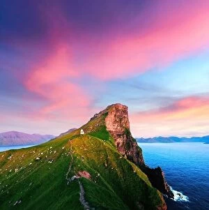 Images Dated 11th August 2019: Incredible sunset landscape with Kallur lighthouse on green hills of Kalsoy island, Faroe islands