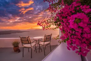 Prints of Santorini island sunset. Caldera view with street and flowers, romantic mood, couple travel vacation landscape destination scenic. Love wallpaper Pop Art Prints: Santorini Island Sunset Print