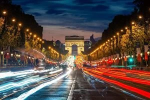 Traffic Jam Collection: Night scence illuminations traffic street of the Impressive Arc de Triomphe Paris along the famous