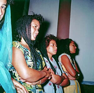 Images Dated 13th January 2012: Three Catholic girls who attend the Christmas Mass in the mission Puunaauia, Tahiti
