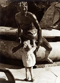 Related Images Collection: Girl near a bronze statue of the Neptune fountain in Piazza della Signoria, Florence