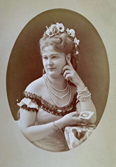 Images Dated 19th January 2016: Half-length portrait of a bejeweled young woman with an elaborate hairdo