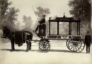 Hearse pull by horses with coachman