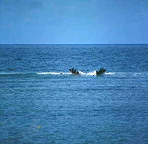Mogadishu Collection: Mogadishu. 'URI', Somalian fishing boats breaking over the wave of the coral reef, for the open sea