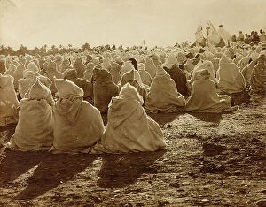 Related Images Collection: Muezzin and muslims in prayer