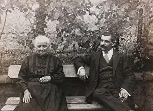 Park Bench Collection: Portrait of a man and an elderly woman in a garden